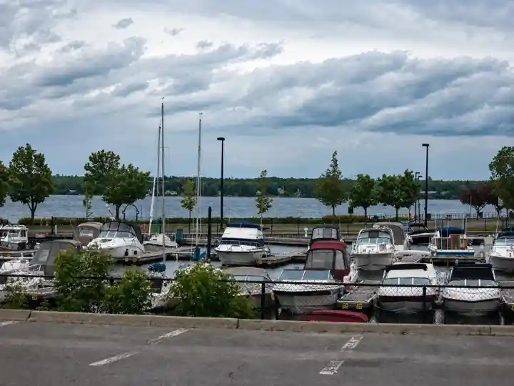 Boats in Brockville marina with the St Lawrence River beyond