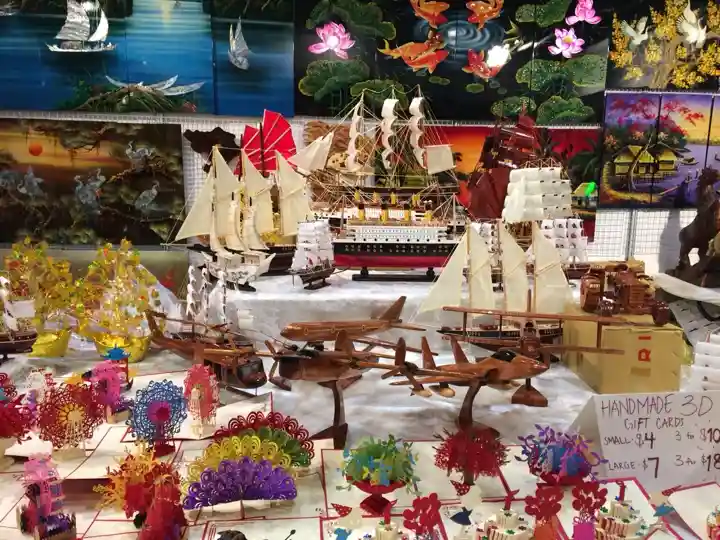 Handmade model ships and paper craft display at a past CNE