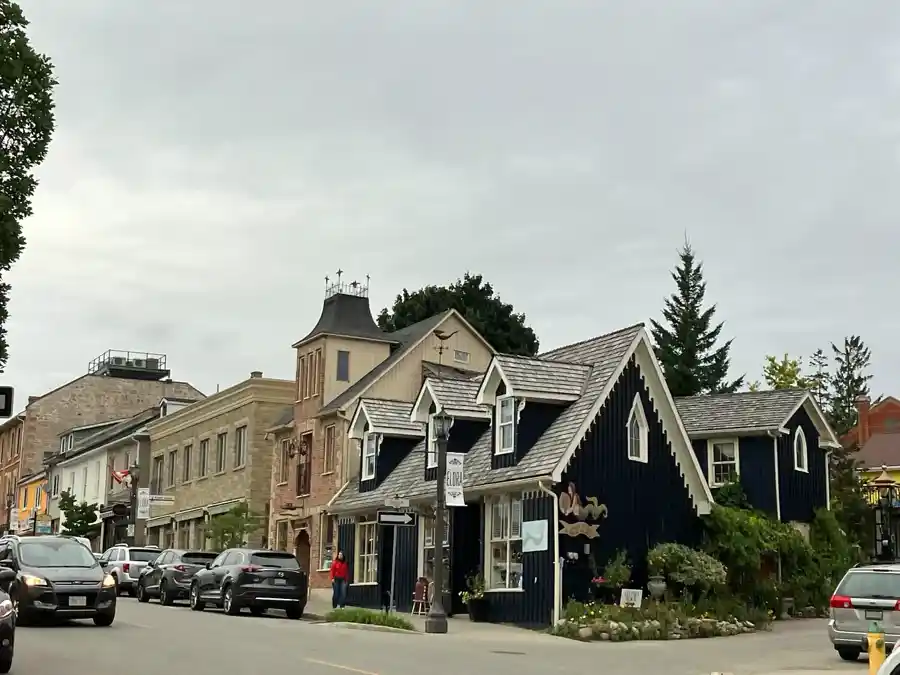 Decorative historic storefronts and varied rooflines in downtown Elora Ontario