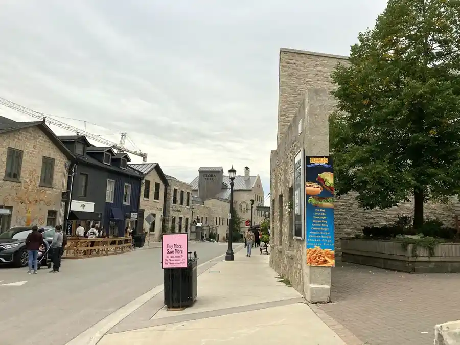 Walkable Elora street with limestone buildings and Elora Mill sign