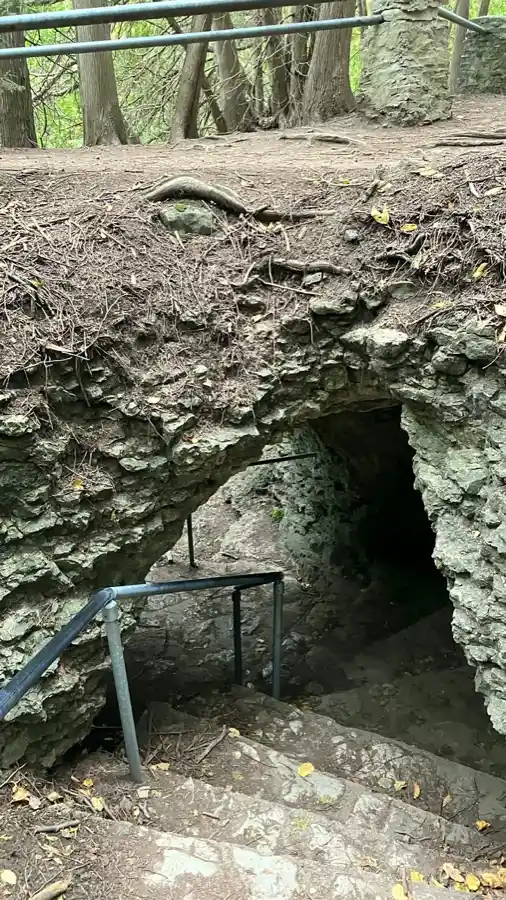 Stone passage and steep handrailed stairs below Victoria Park in Elora