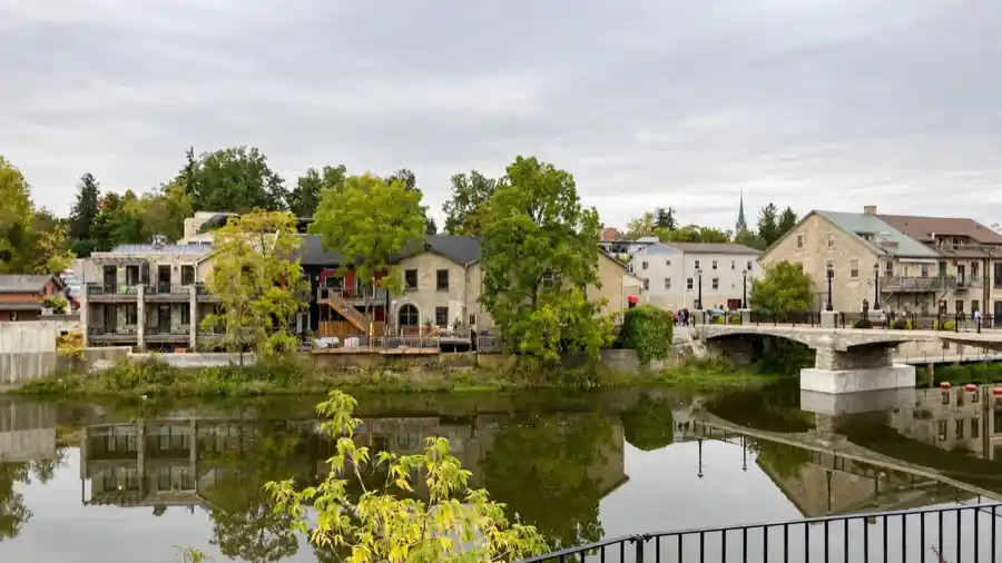 Historic Elora village and bridge reflected in the Grand River