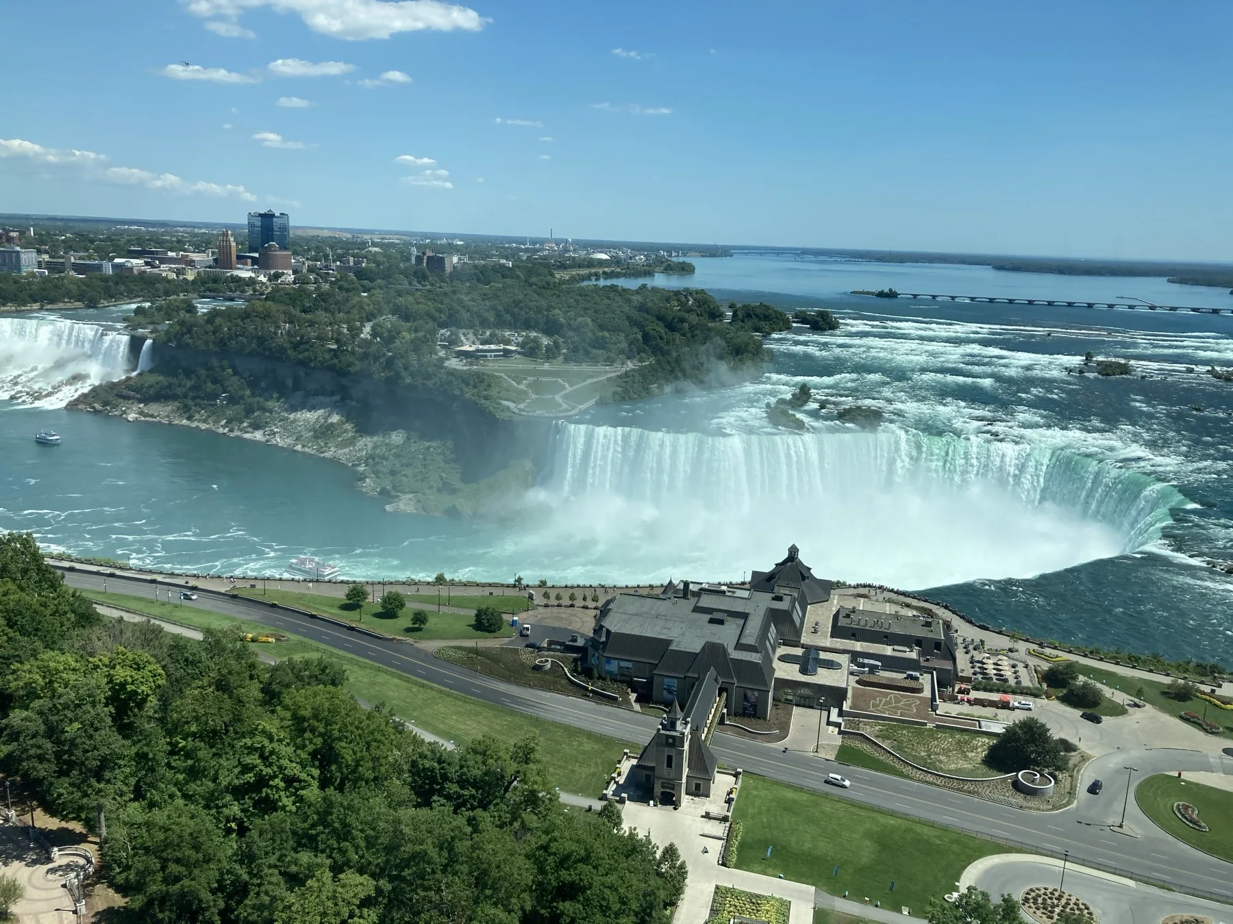 High-floor view of Horseshoe Falls and the Niagara River in Niagara Falls Ontario